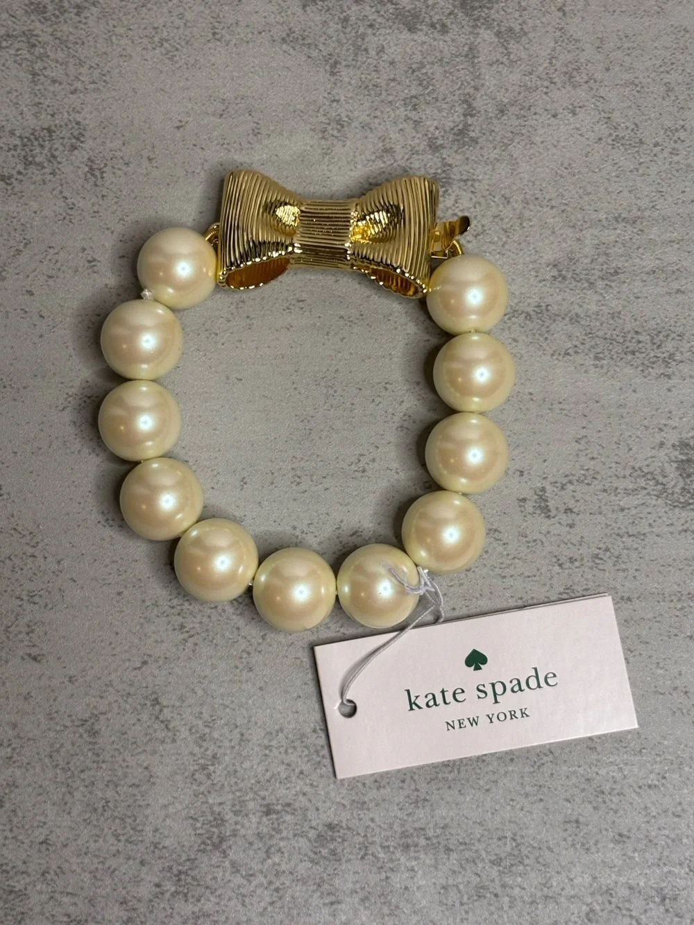 Kate Spade All Wrapped Up Faux Pearl Bracelet with Gold Bow Closure